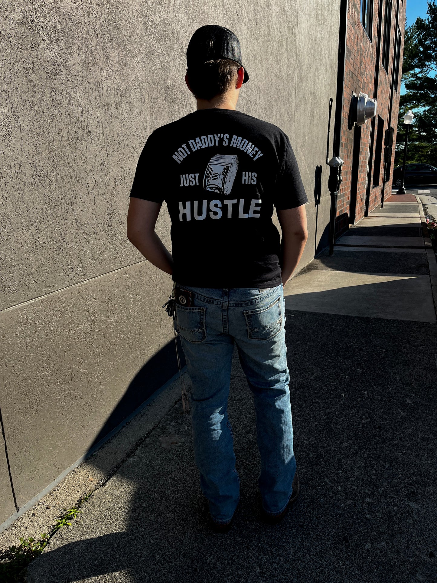 hustler raised tee